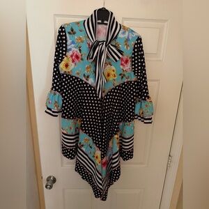 Custom made blue and pink floral and polka dot blouse with a stripe accent.